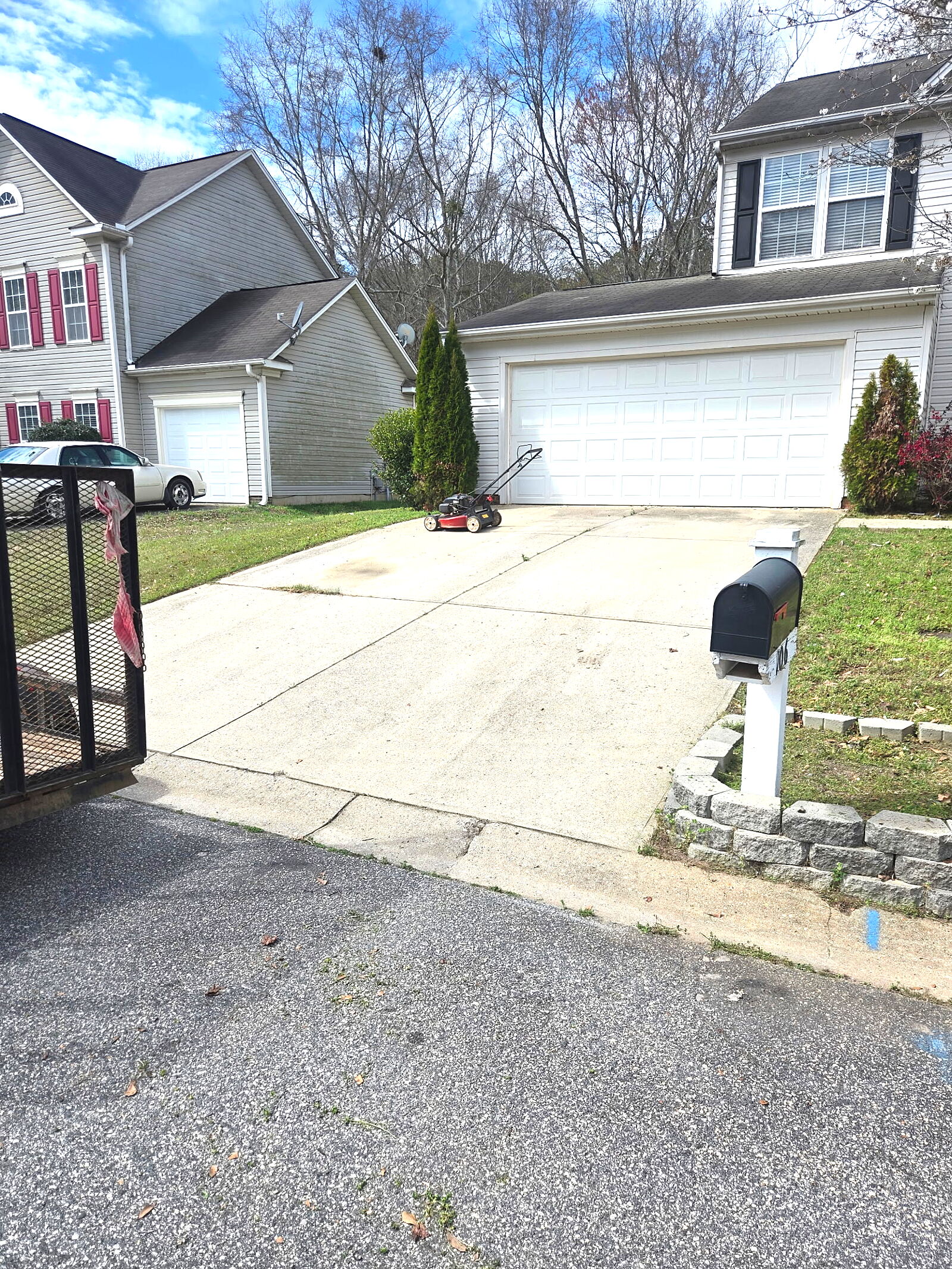 LawnSkapers mower on driveway during a routine cut