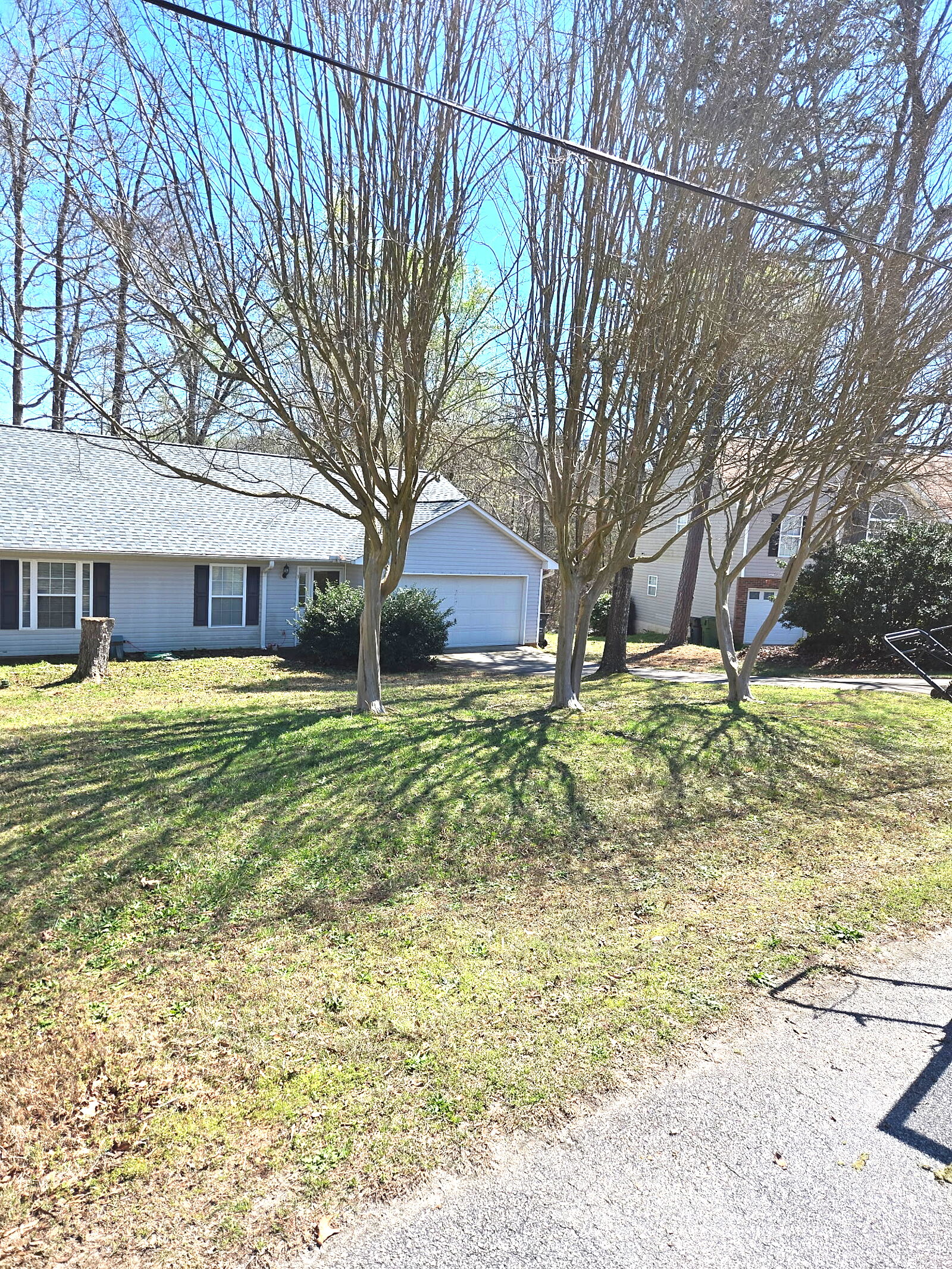 Ranch home property before cleanup work